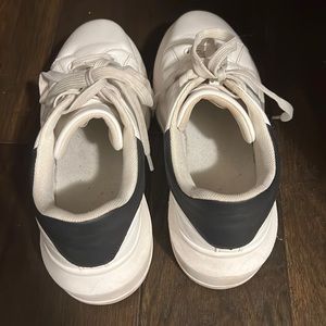 Selling these white sneakers